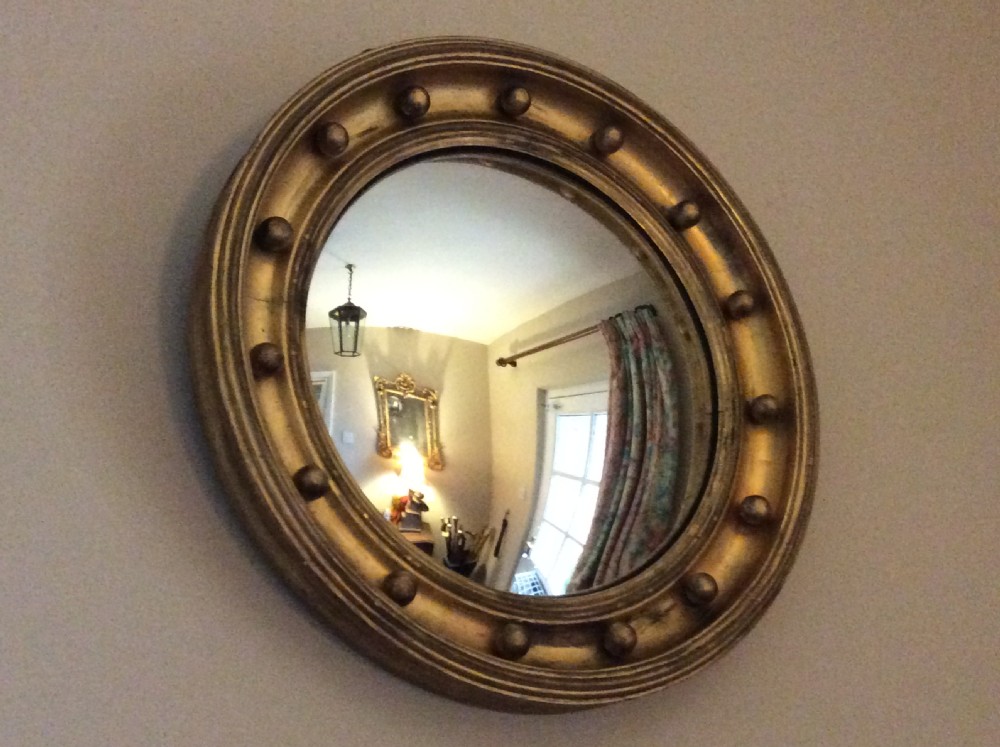 An early 19thC convex wall mirror View X