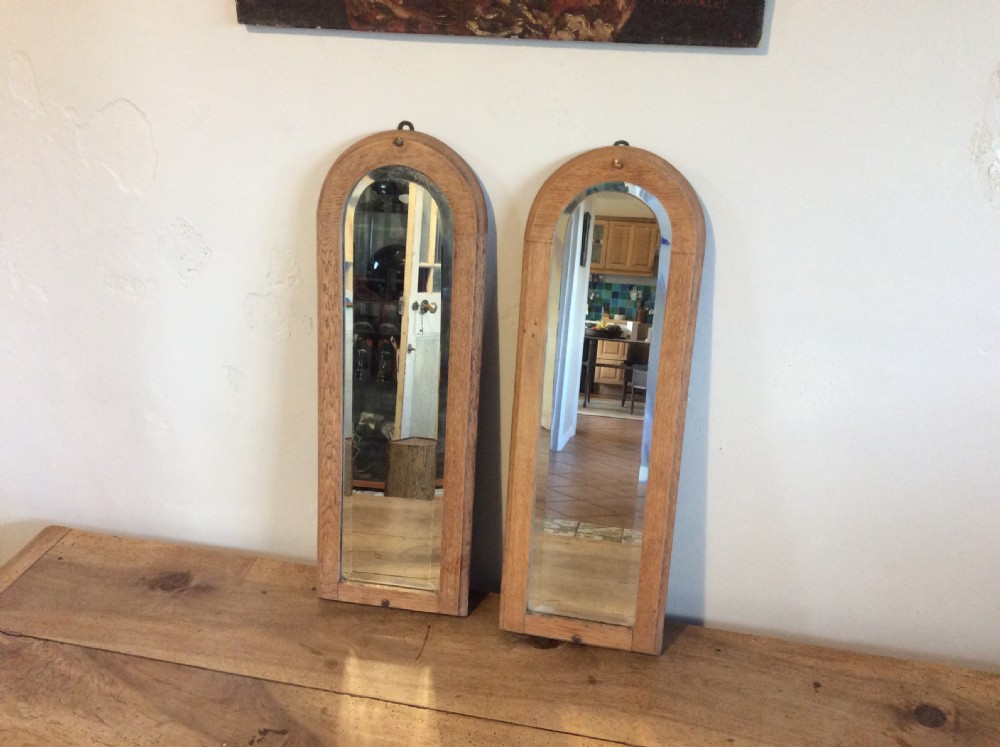 A pair of bleached oak framed pier mirrors View III