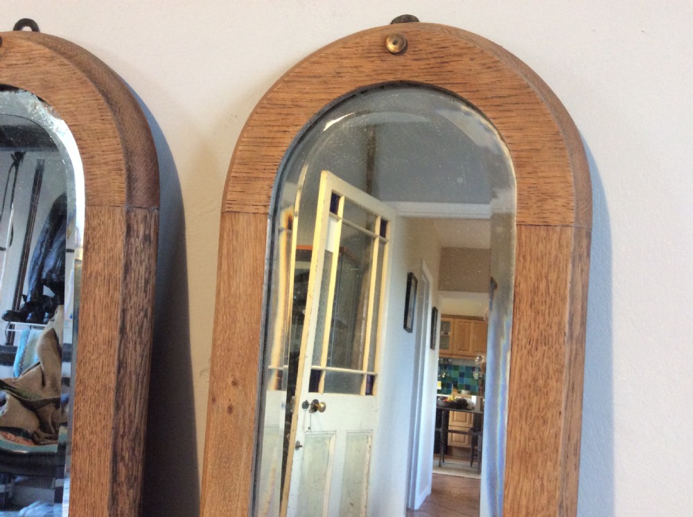 A pair of bleached oak framed pier mirrors View IV