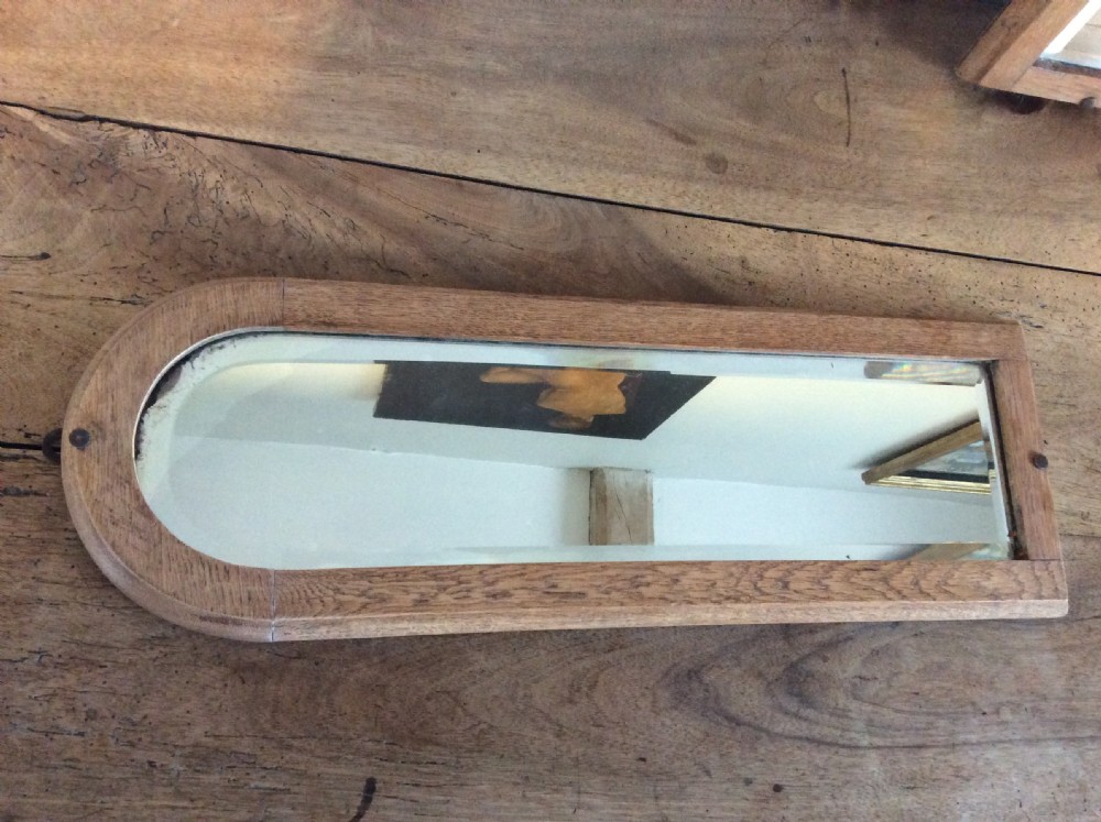 A pair of bleached oak framed pier mirrors View V