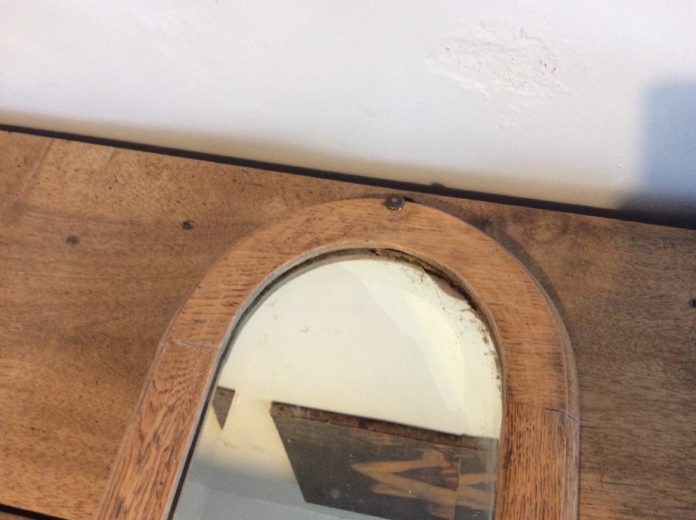 A pair of bleached oak framed pier mirrors View X