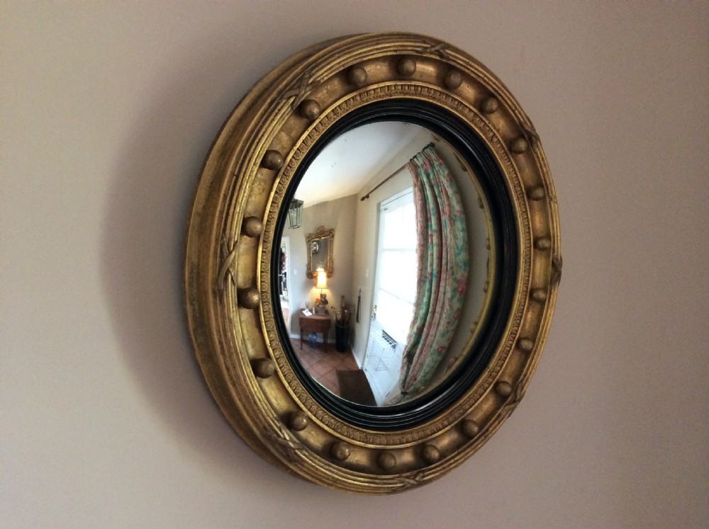 A 51cm dia convex wall mirror
