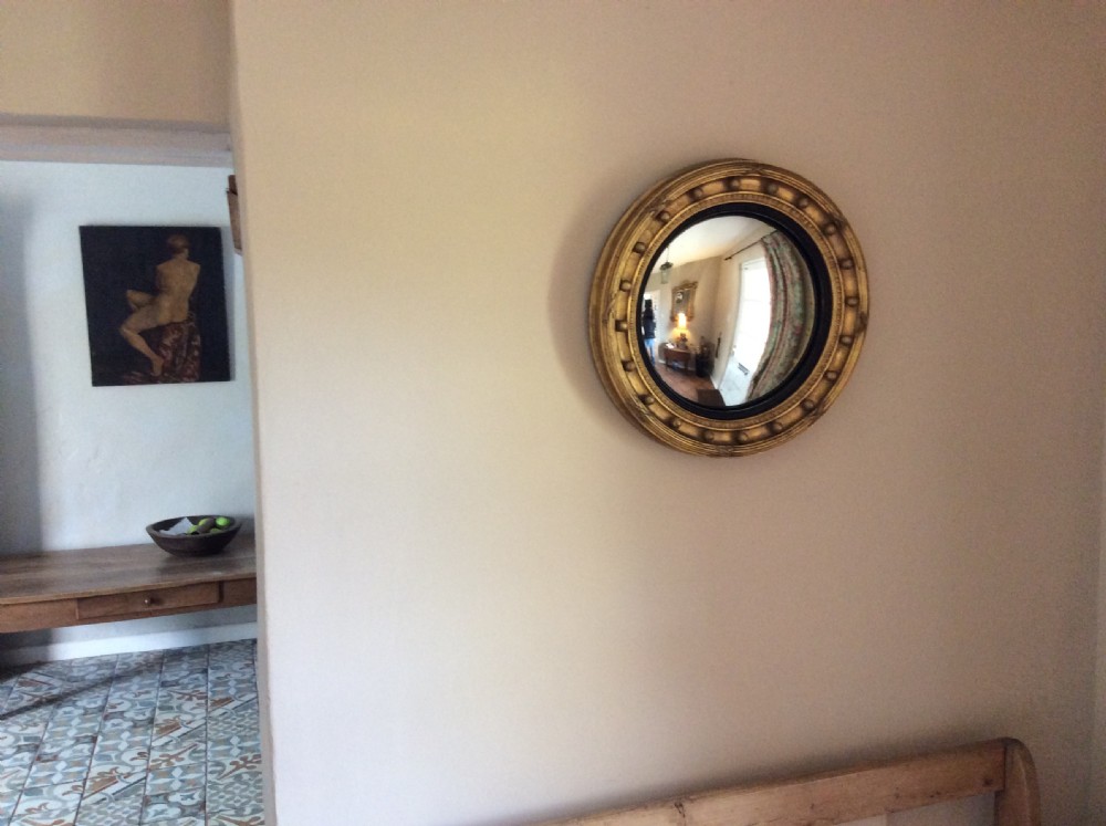 A 51cm dia convex wall mirror View II