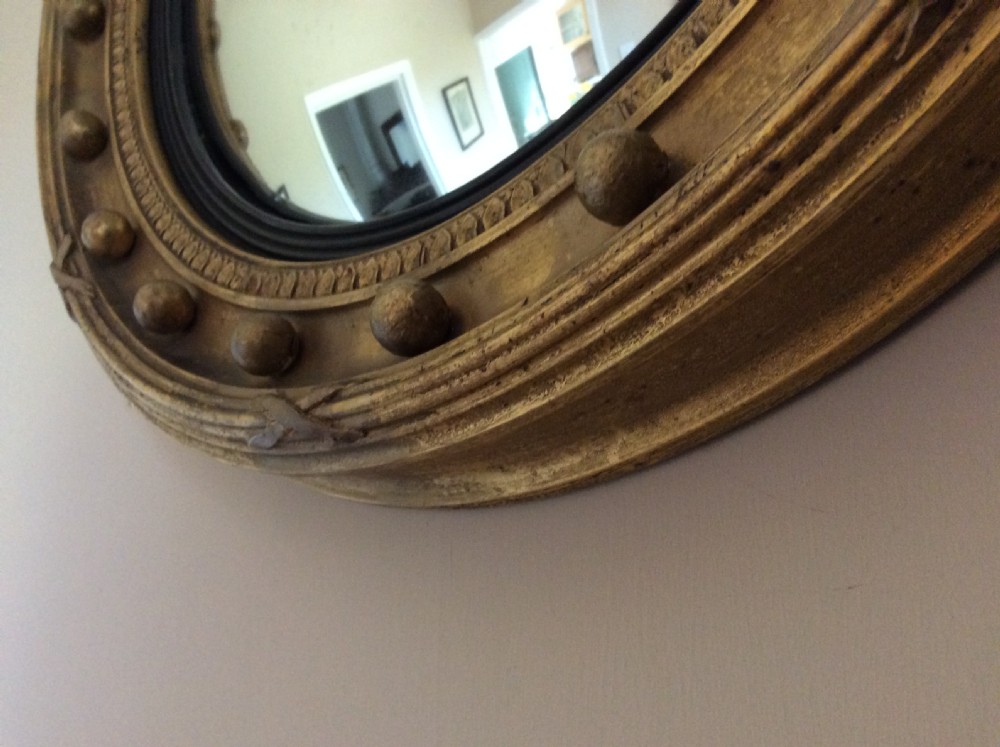 A 51cm dia convex wall mirror View VI
