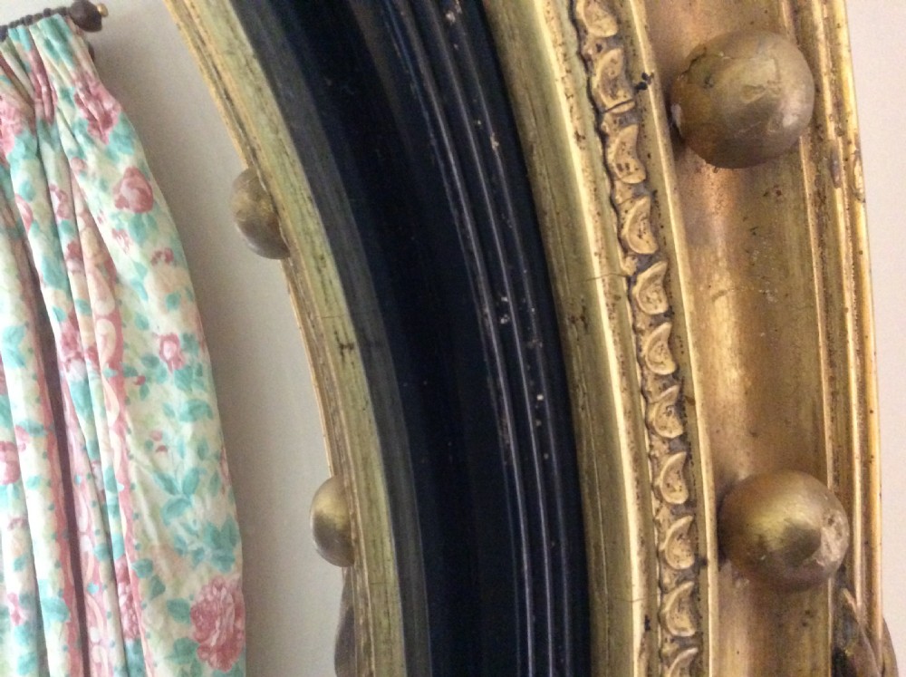 A 51cm dia convex wall mirror View VII