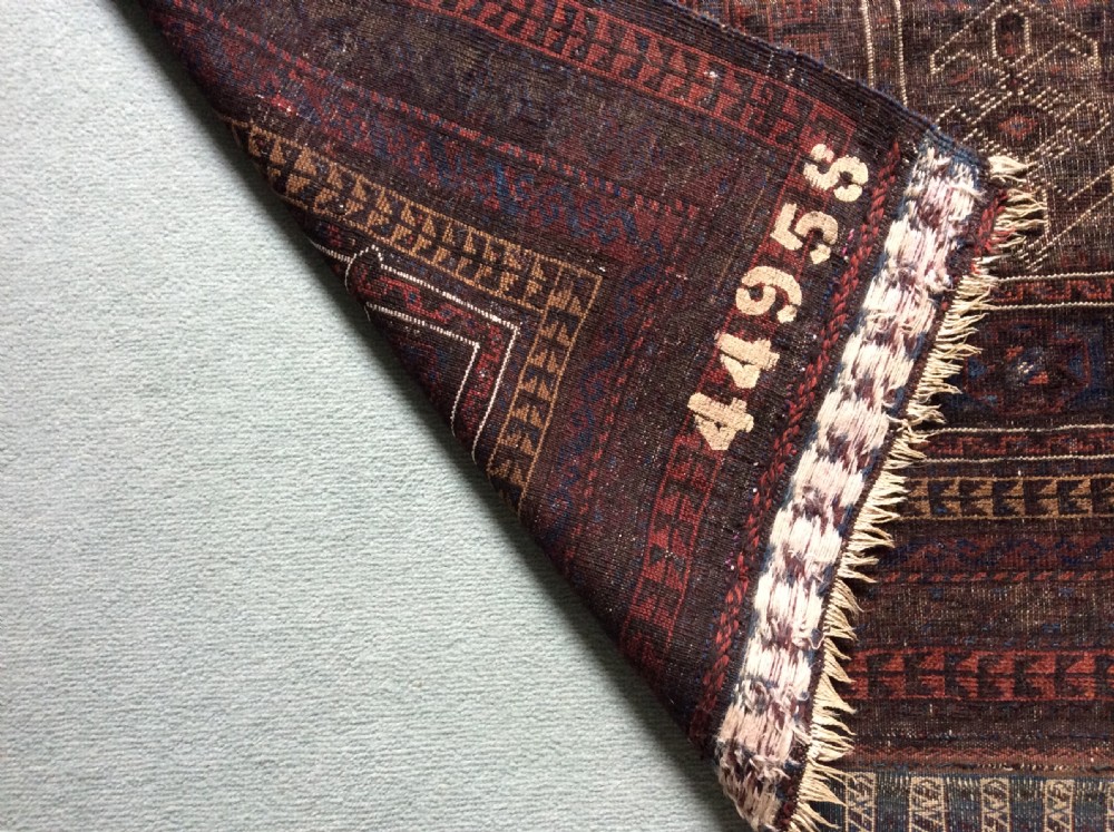 A small antique Caucasian hall rug View VII