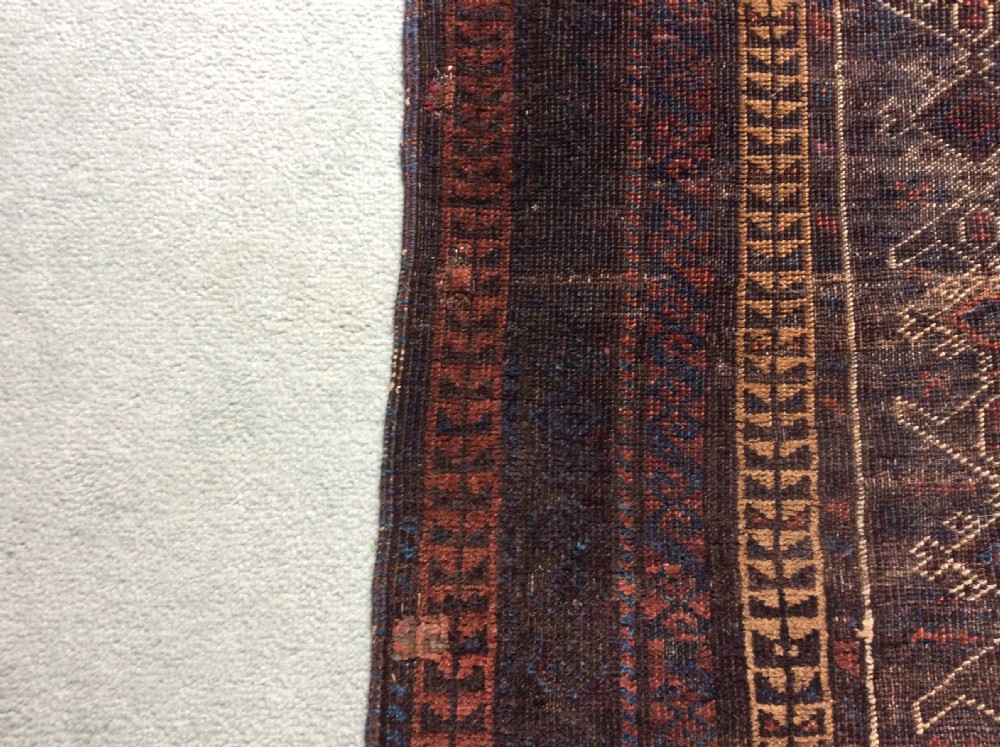 A small antique Caucasian hall rug View IX