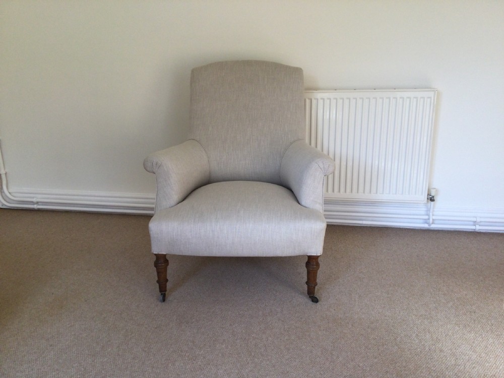 A 19thC French upholstered armchair