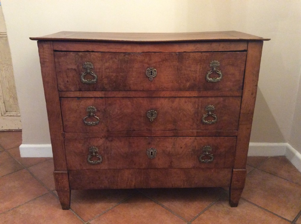 A small walnut chest of drawers