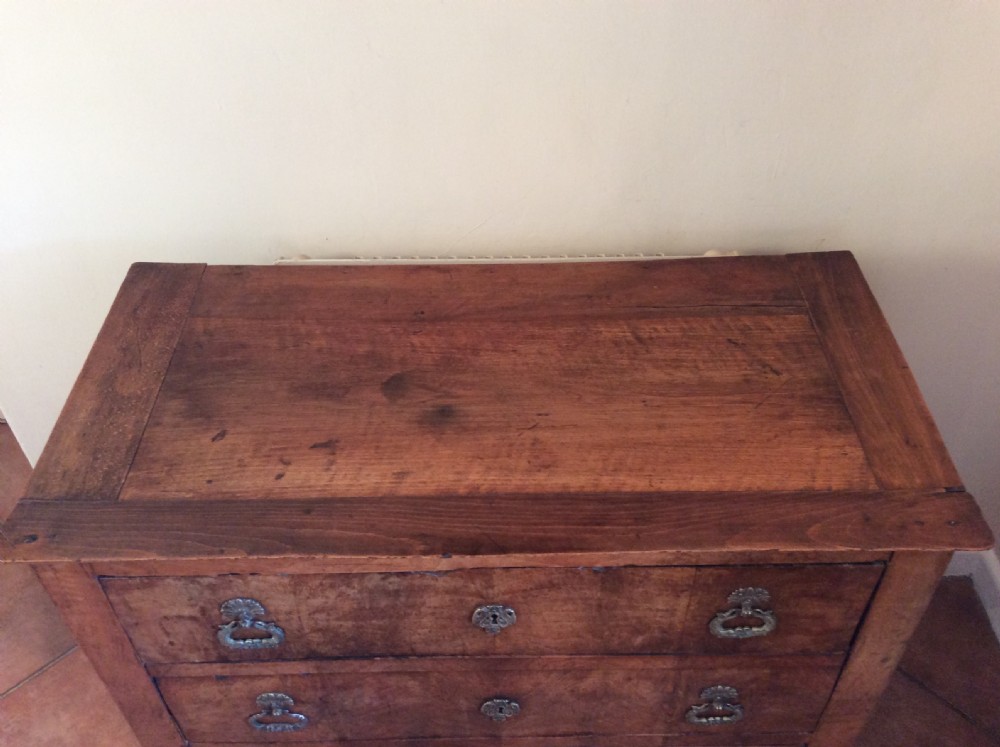 A small walnut chest of drawers View VI