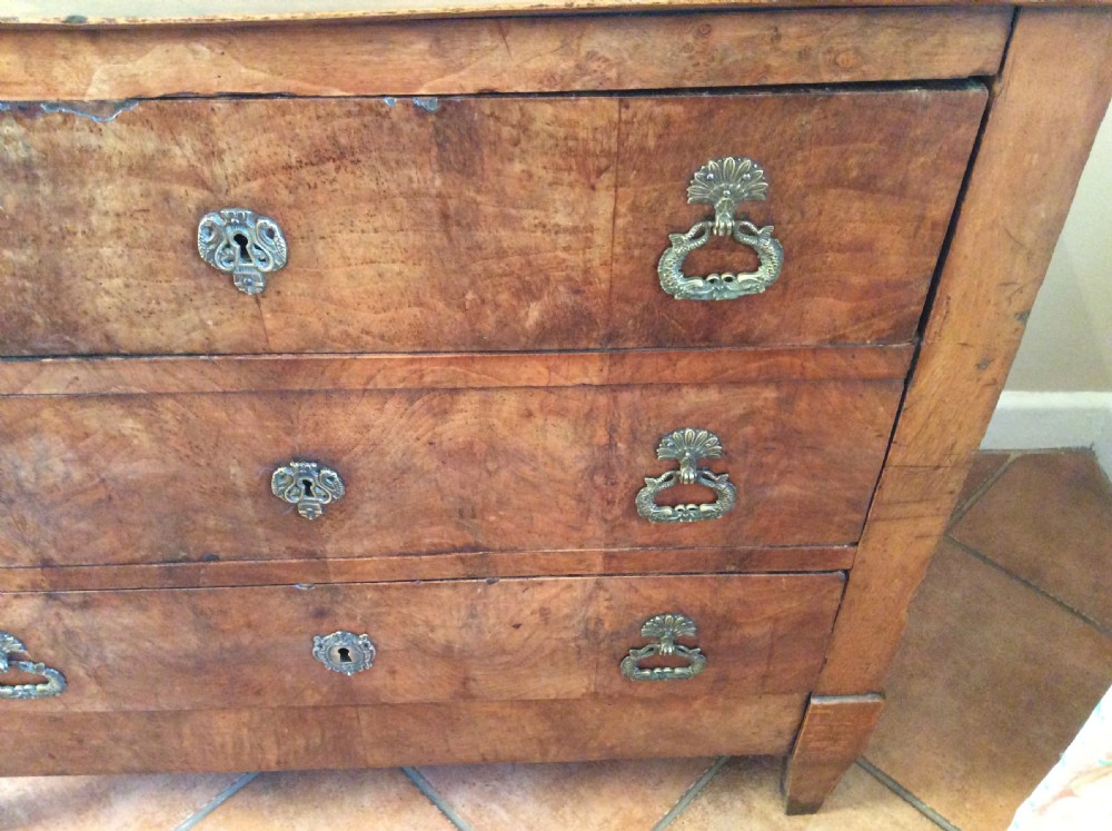 A small walnut chest of drawers View VII