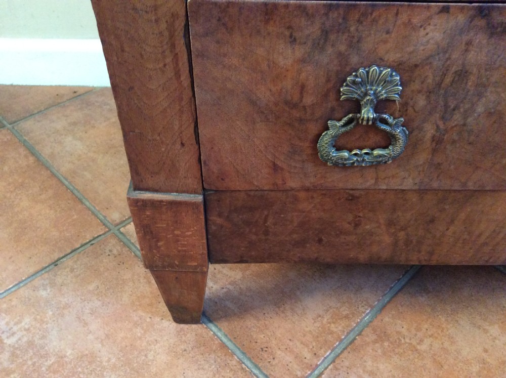 A small walnut chest of drawers View VIII