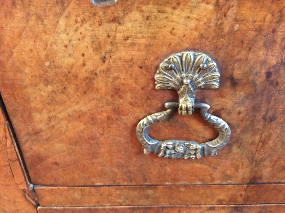A small walnut chest of drawers View IX