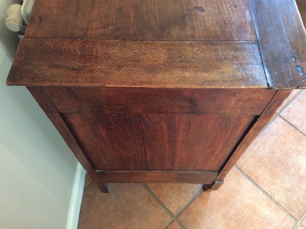 A small walnut chest of drawers View X