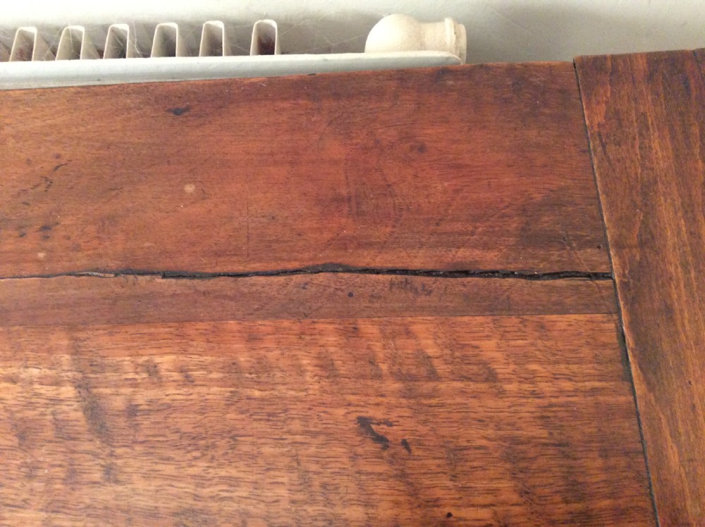 A small walnut chest of drawers View XII