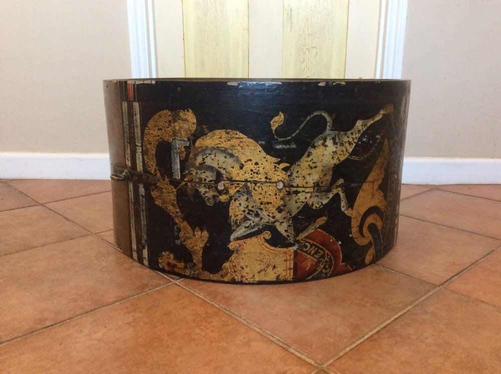 A 19thC decorative drum case coffee table