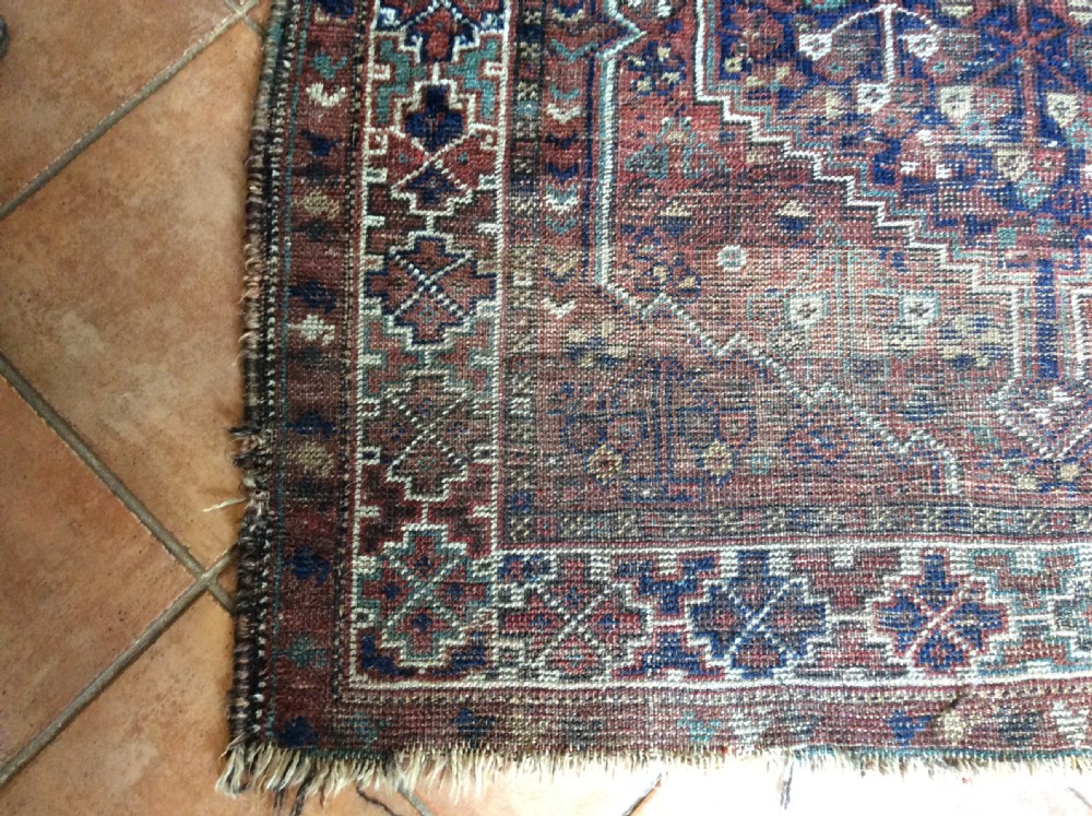 An antique 173cm x 122 Caucasian rug View IV
