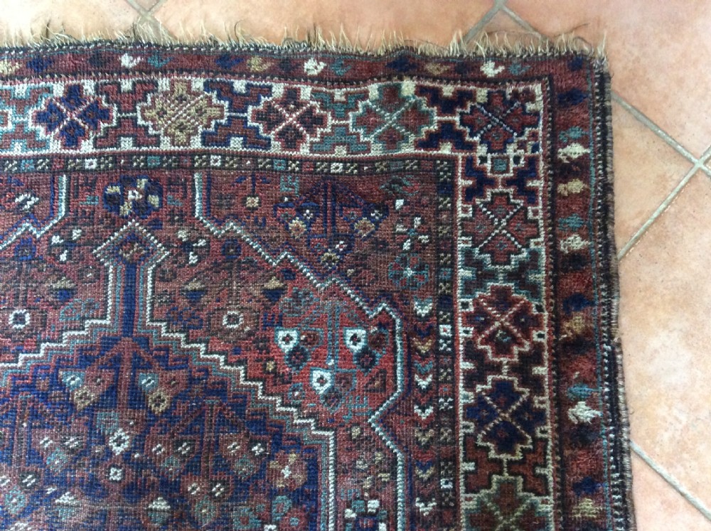 An antique 173cm x 122 Caucasian rug View VI
