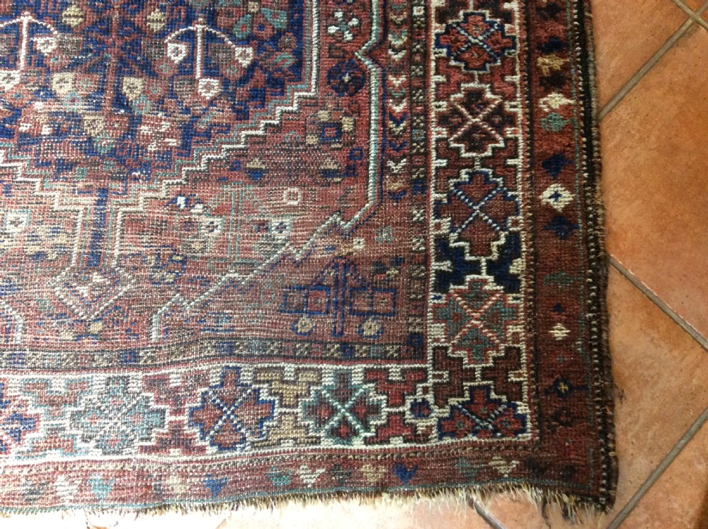 An antique 173cm x 122 Caucasian rug View VII
