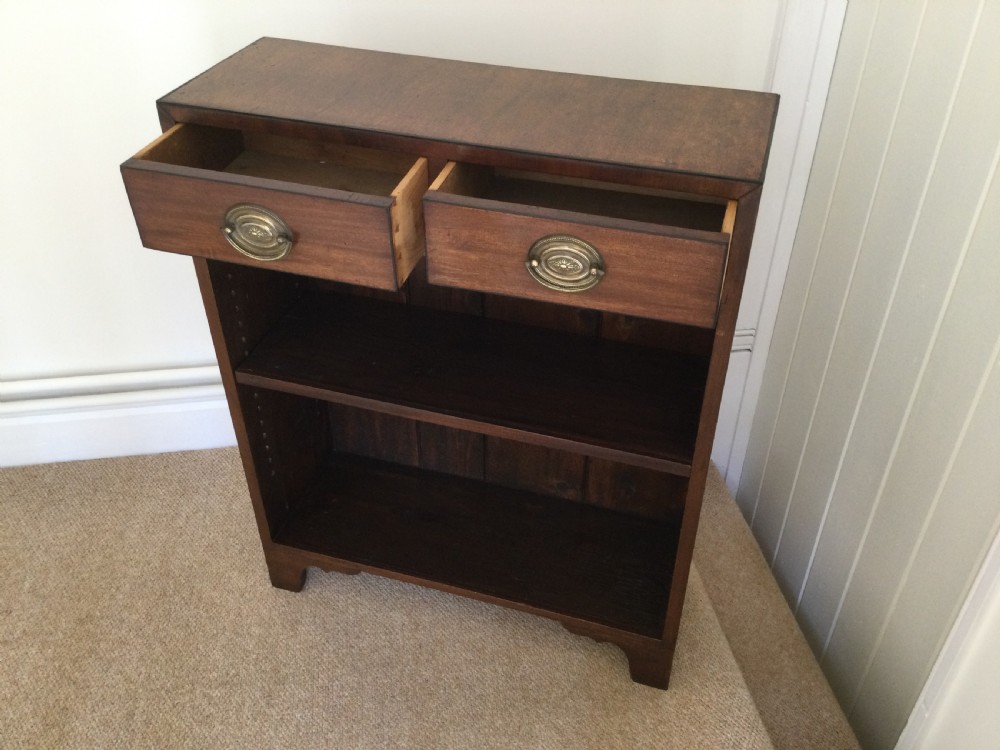A small open bookcase View III
