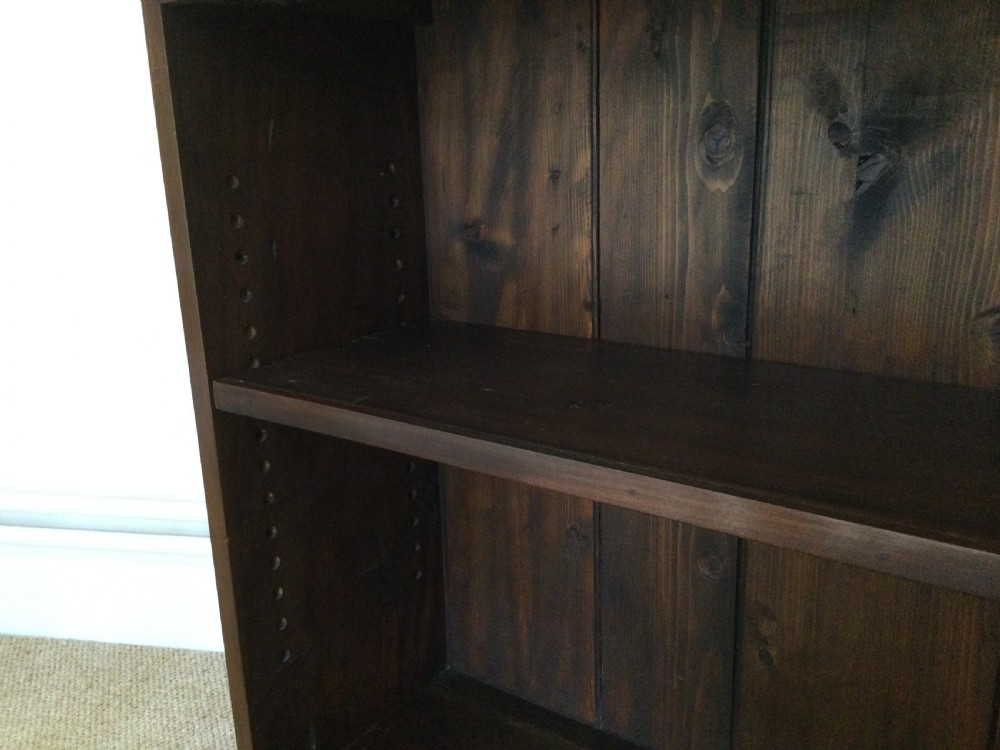 A small open bookcase View V