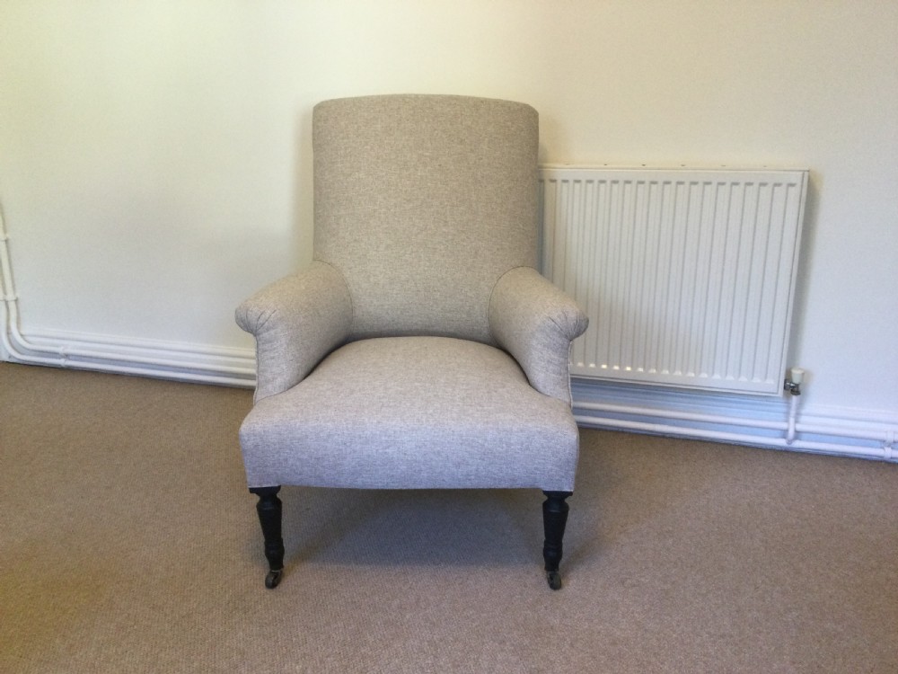 A French upholstered armchair