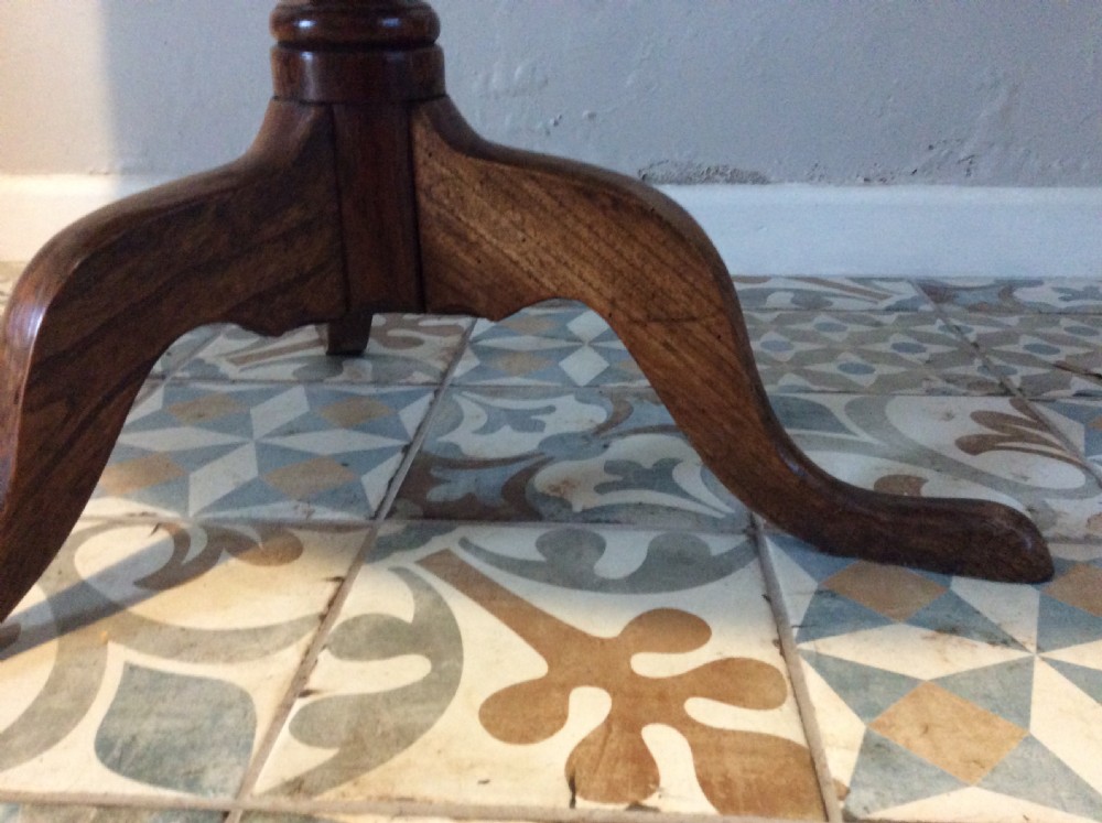 A Georgian oak and elm tilt top tripod table View VI