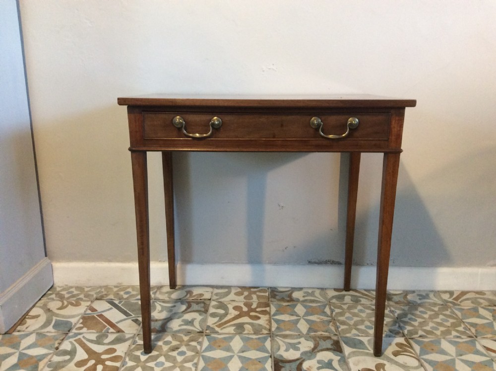 A late Georgian mahogany side table