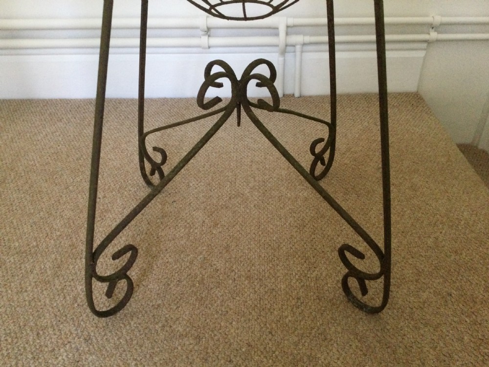 A wirework plant stand  View III
