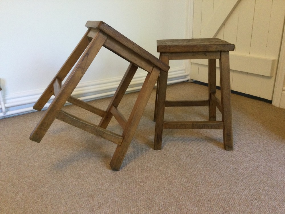 A pair of  elm topped stools