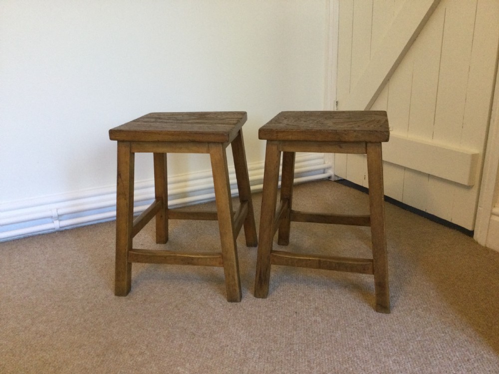 A pair of  elm topped stools View II