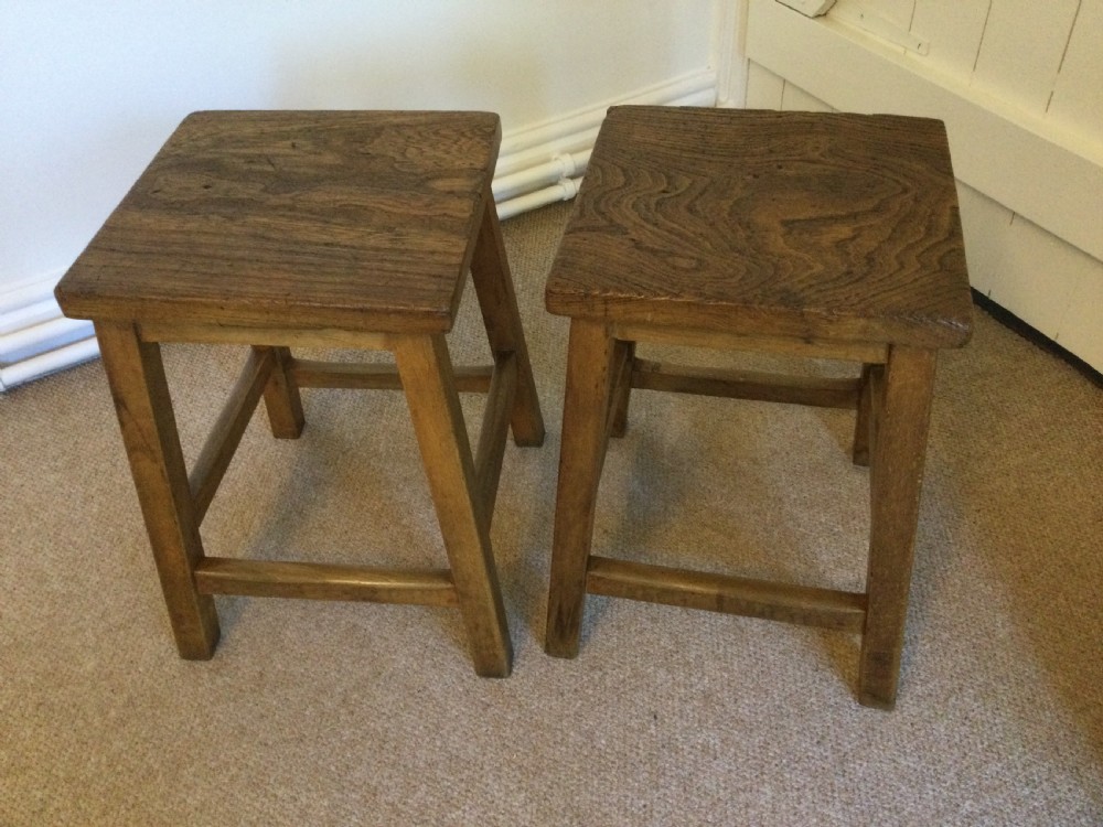 A pair of  elm topped stools View III