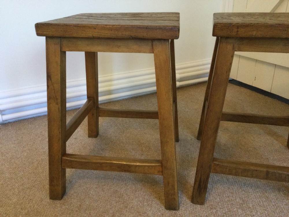A pair of  elm topped stools View V
