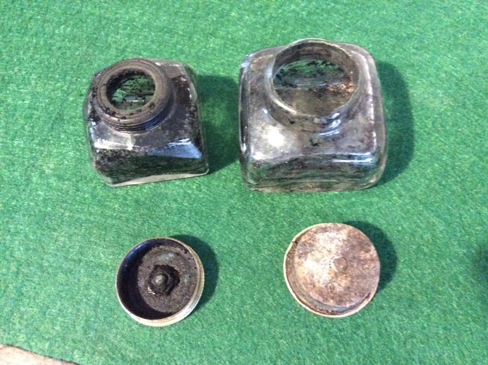 A closed 19th-century dark mahogany campaign writing slope with flush brass side handles and a brass escutcheon with key. View V
