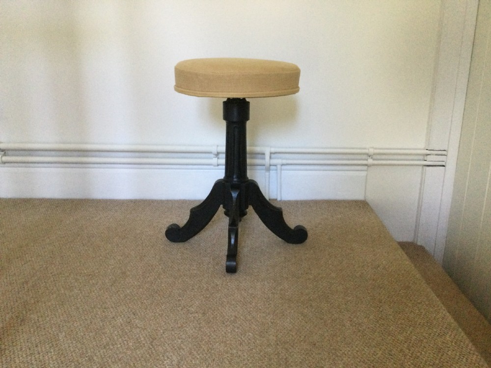 A 19thC French ebonized piano stool