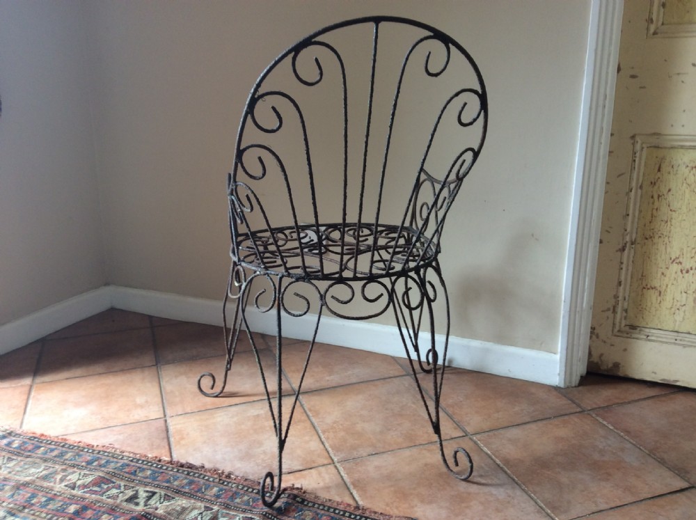A 19thC wirework garden chair View VI