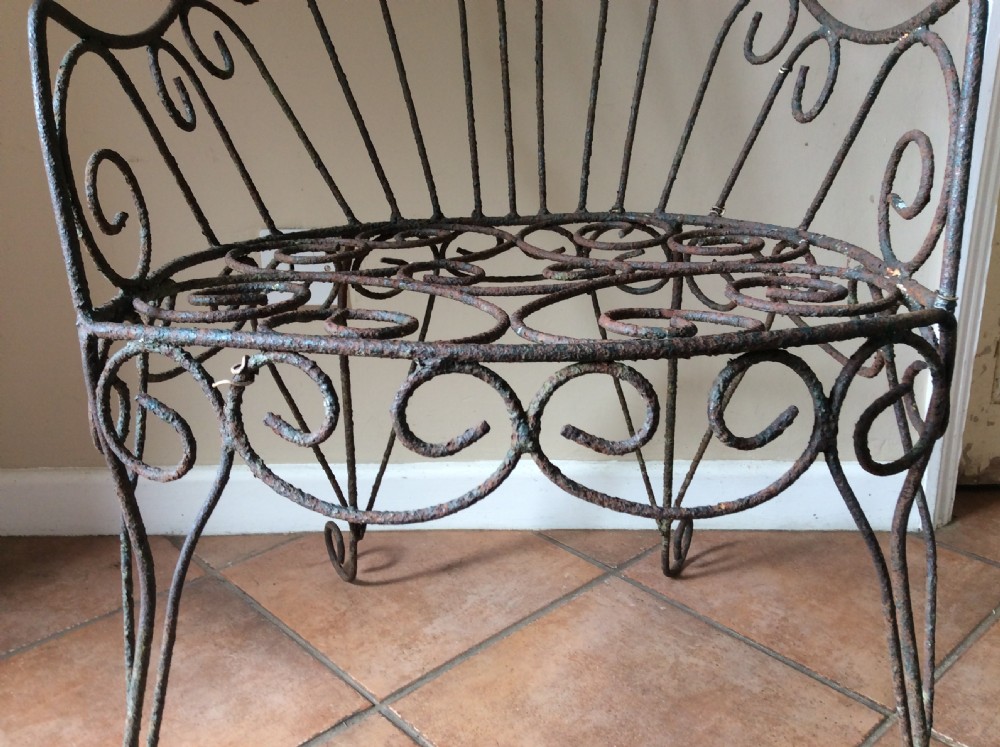 A 19thC wirework garden chair View X