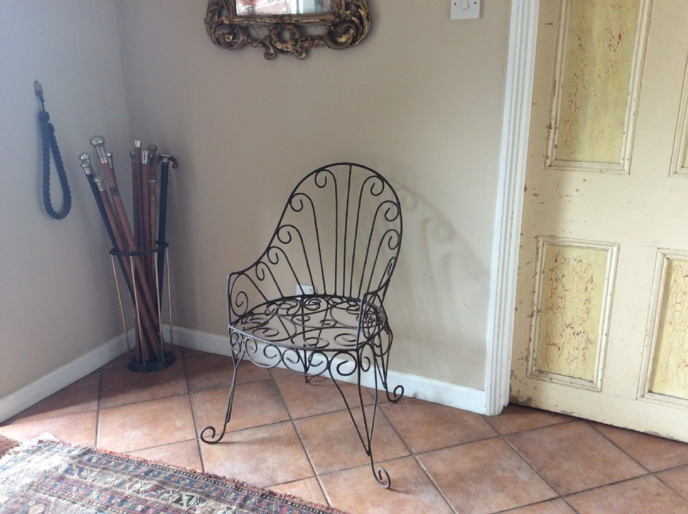 A 19thC wirework garden chair View XVI