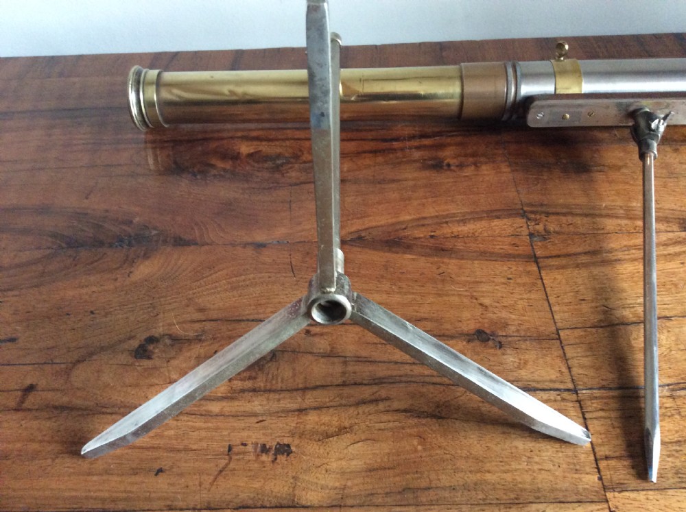 An Art Deco period table telescope. View IX