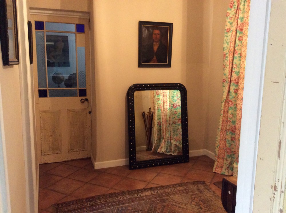 An ebonised French overmantle mirror View II