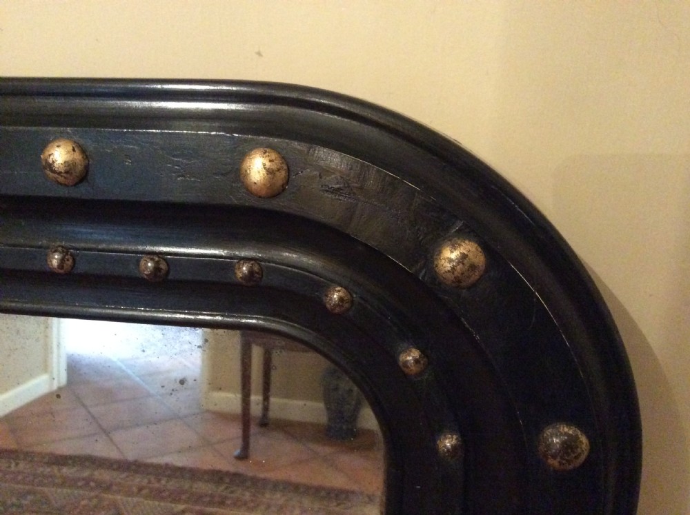 An ebonised French overmantle mirror View IV