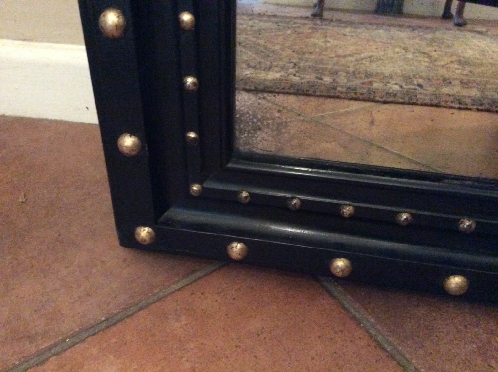 An ebonised French overmantle mirror View V