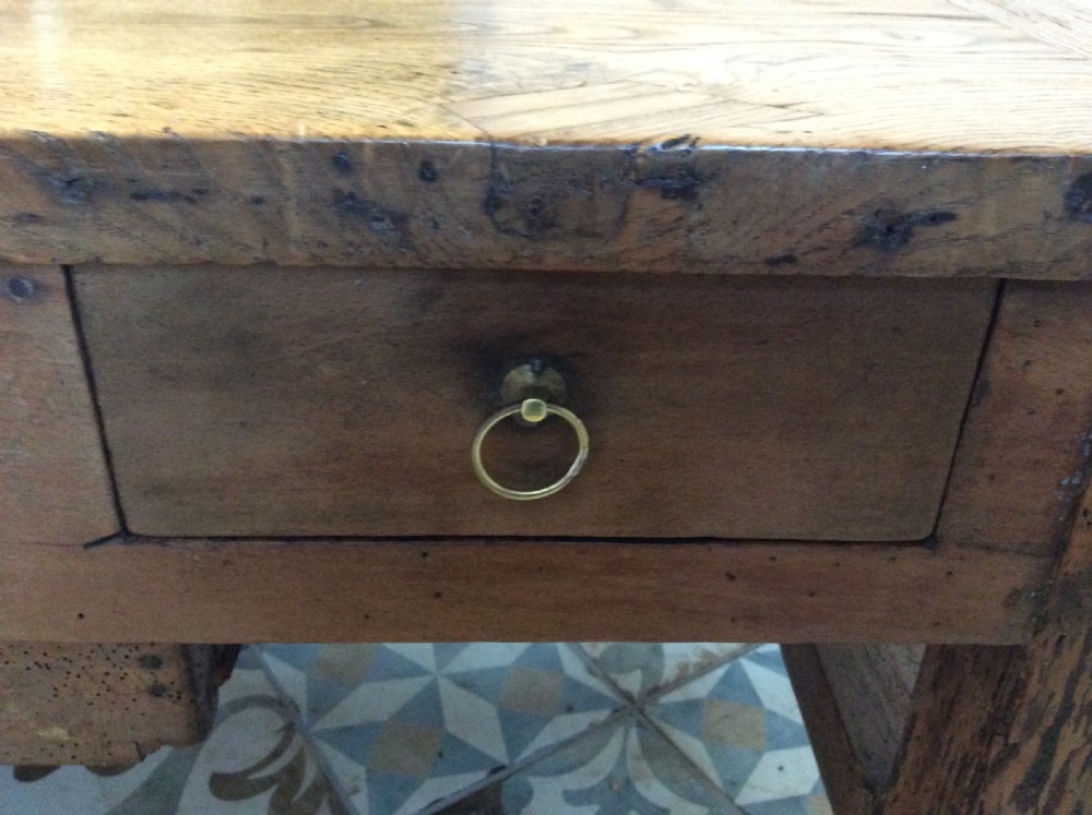 A French elm topped coffee table View IV