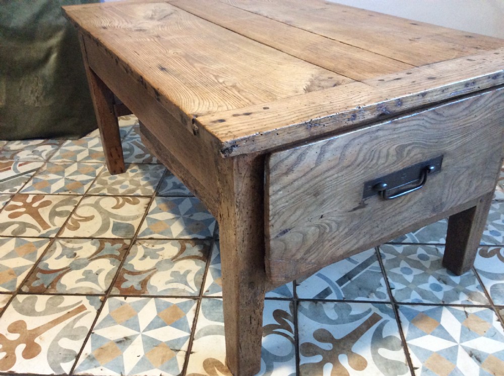 A French elm topped coffee table View VI
