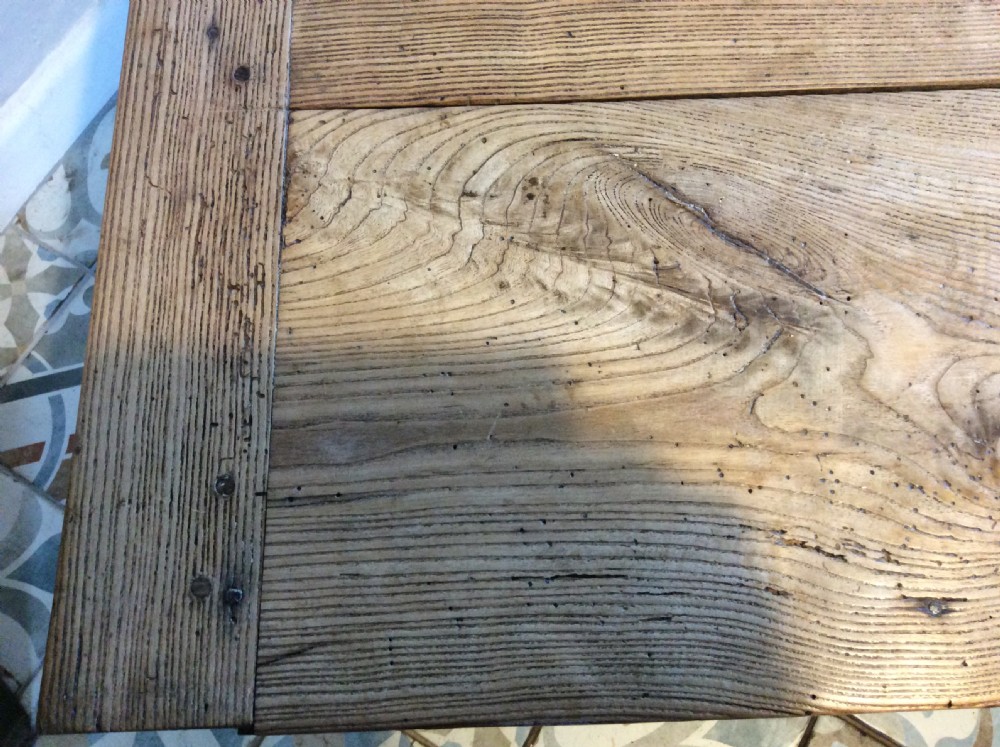 A French elm topped coffee table View VIII