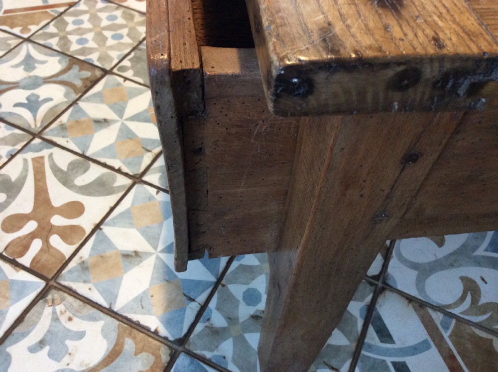 A French elm topped coffee table View IX