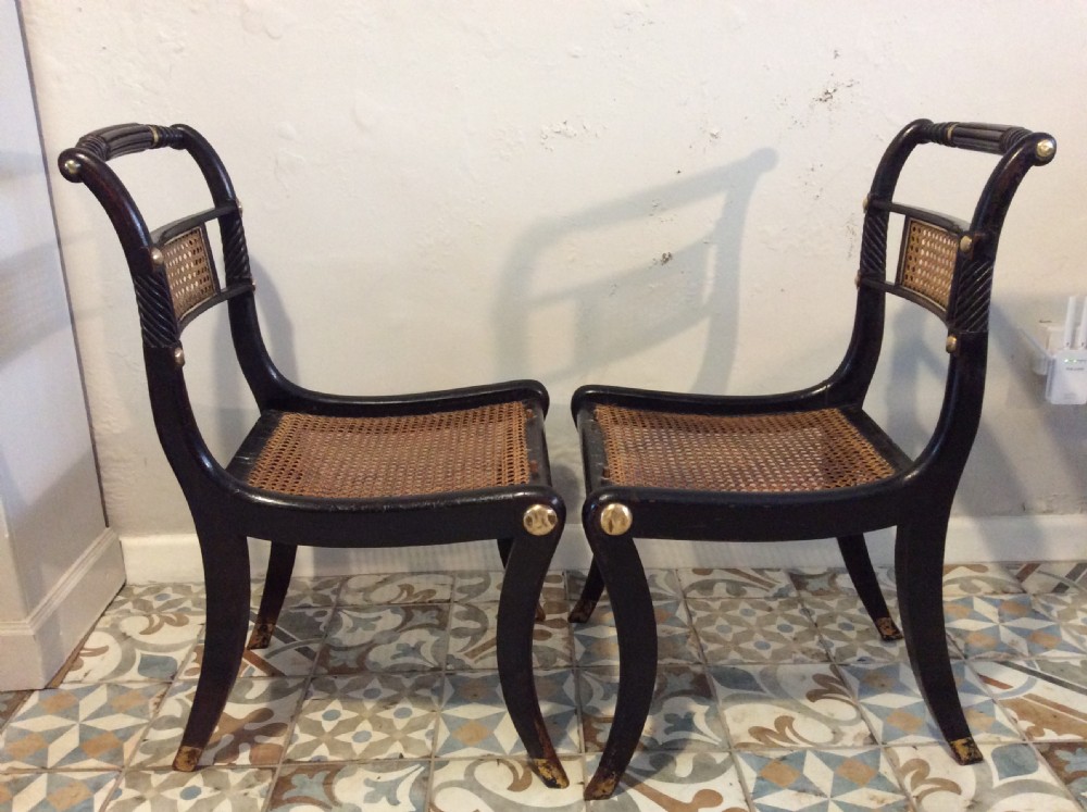 A pair of Regency hall chairs View II