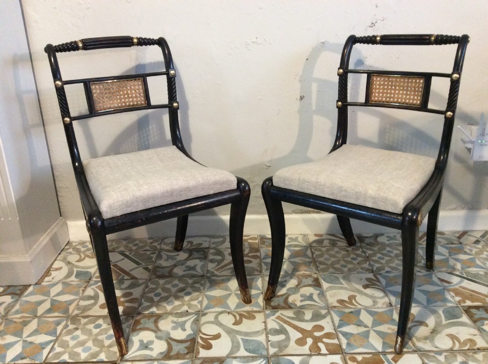 A pair of Regency hall chairs View III