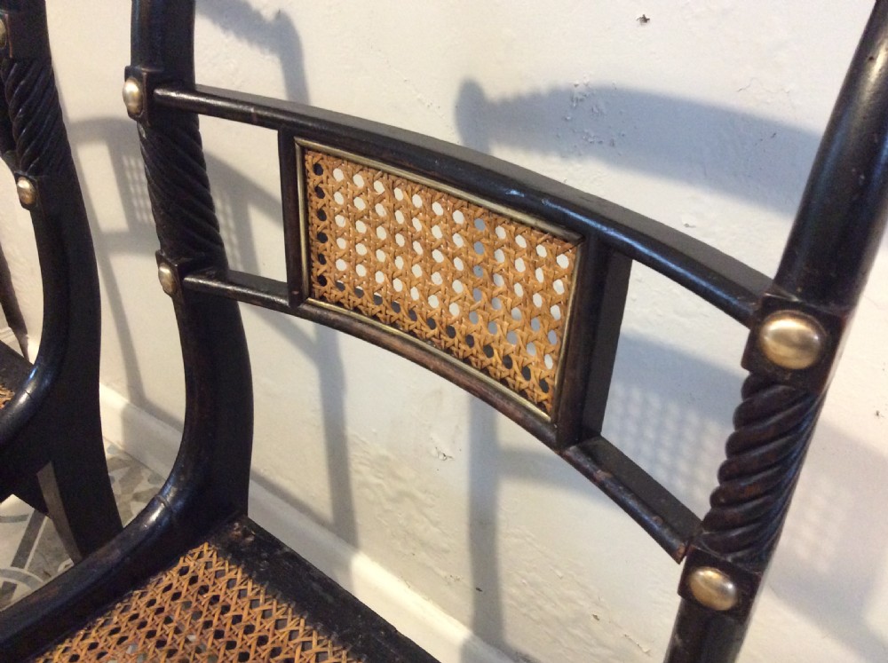 A pair of Regency hall chairs View IX