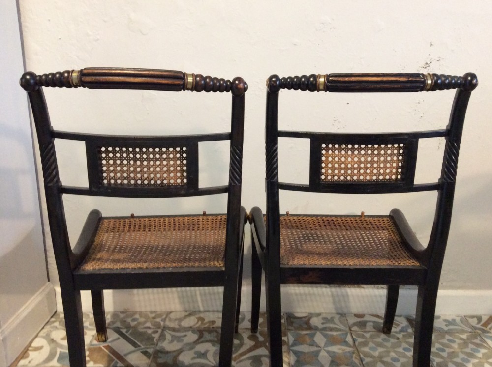 A pair of Regency hall chairs View XII
